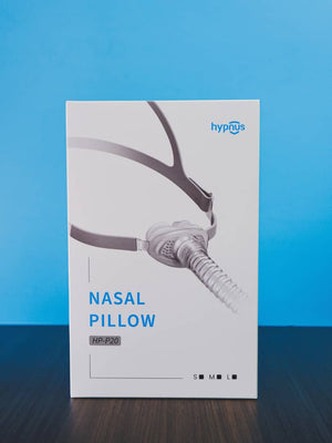Hypnos nasal pillow packaging on a blue background