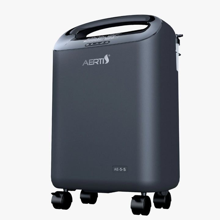 Dark gray Aerti oxygen concentrator with handle, digital display, control buttons, and four caster wheels.