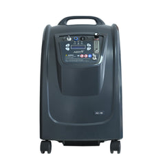 Dark gray oxygen concentrator with LCD display, control buttons, flowmeter, and wheels at the base.