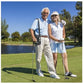 Older man outdoors on golf course wearing a black Inogen One G5 oxygen concentrator carrying case with shoulder strap.