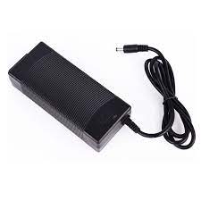 Black rectangular lithium battery charger with ridged surface and attached power cable with plug.