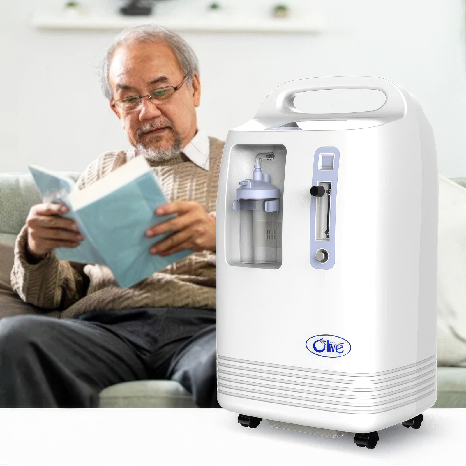 White and blue Olive 10L oxygen concentrator with handle, flowmeter, and humidifier bottle on table.