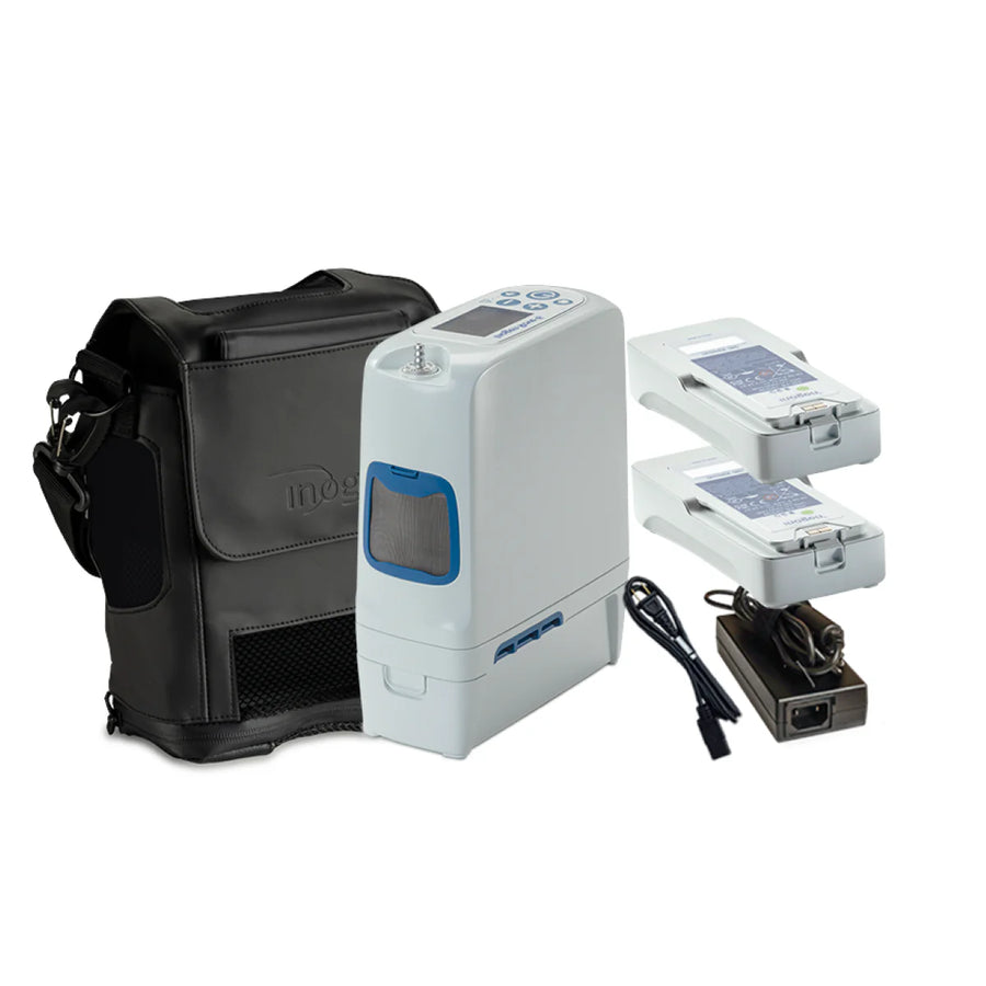 White portable oxygen concentrator with blue accents, two batteries, power adapter, and black carrying case.